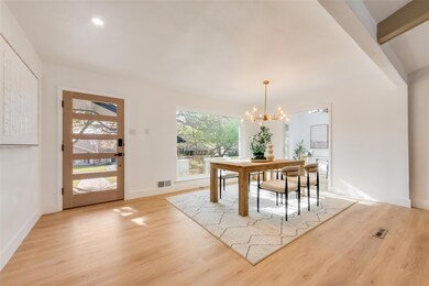 Dining room featuring baseboards, visible vents, a