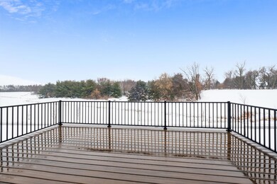 An amazing private backyard view overlooking a pond & trees