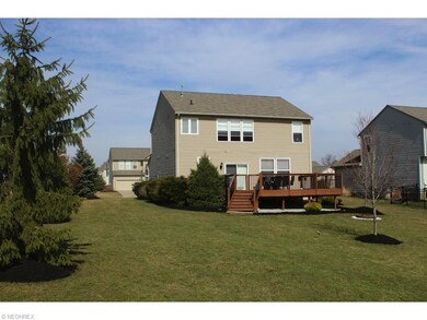 Private large deck backs to green space.