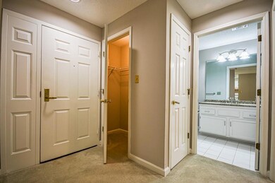 Welcome to condo #221! Front foyer with large stor