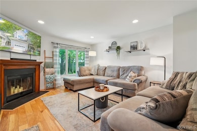 Living area featuring a fireplace with flush heart