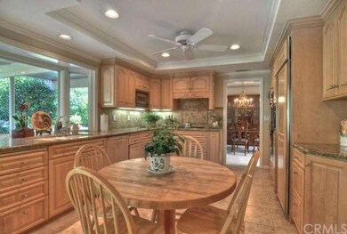 Lovely bay window overlooks the yard, custom maple