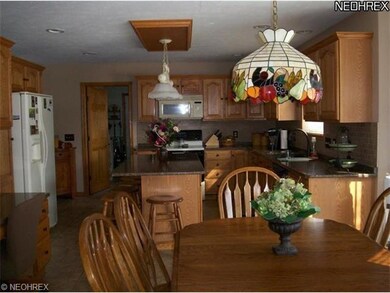 The eat-in-kitchen has plenty of room for a large 
