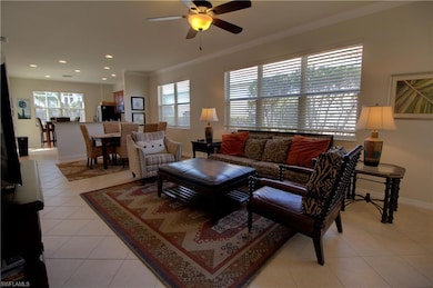 great room with tile on the diagonal, crown moldin