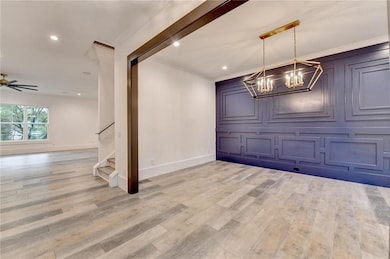 Unfurnished dining area with light wood-type floor