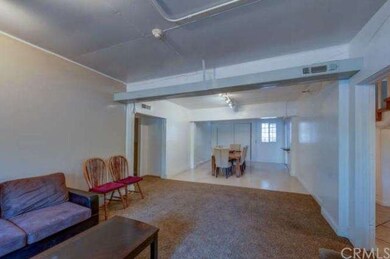 Living Room Opens to Dining Room