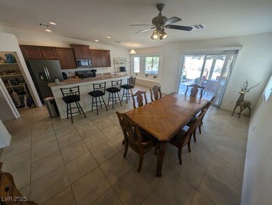 Dining area featuring recessed lighting, visible v