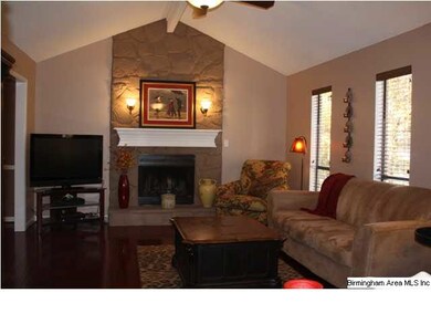 Great Room with hardwood floors, vaulted ceiling, 