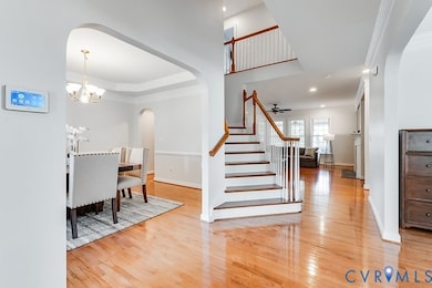 View 2 - Foyer with Views of Dining Room on the Left, Office on the Right, and Family Room Straight Ahead