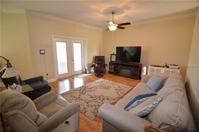 Great Room...french doors with blinds between glas