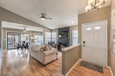 Foyer featuring light wood-type flooring, lofted c