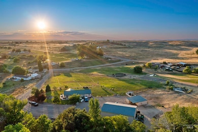 Aerial view of property's location featuring rural landscape