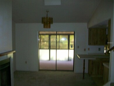 Dining room with slider to Florida room