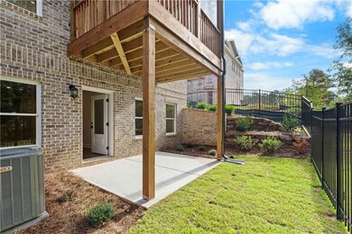 Fenced backyard featuring a patio