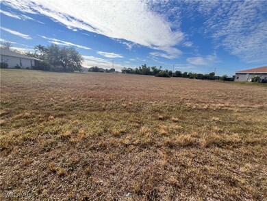 View of yard with a rural view