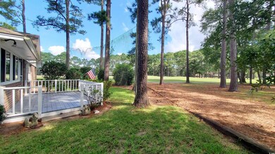 View of back yard featuring a deck