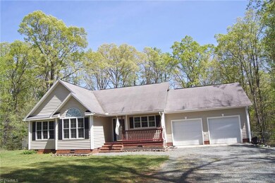 Extra-Wide Gravel Drive, this home is nestled back in trees in lovely Cristal Farms