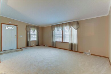 Spacious living room with vaulted ceilings.
