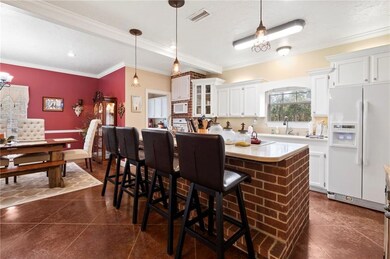Open Kitchen with brick accents