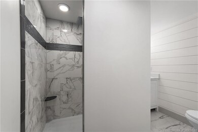 Main Bedroom bath w/ shiplap & tile shower