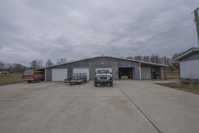 6 Bay detached garage- 2 bays have openers. 