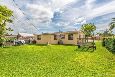 View of home from the back yard. Fenced-in for your convenience