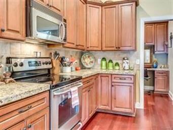 Nice stainless steel appliances- the stove has fiv