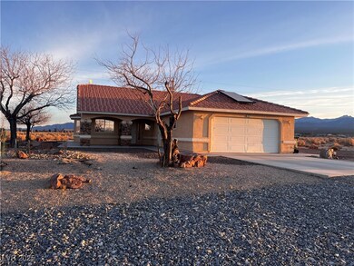 View of front of home featuring an attached garage