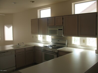 Kitchen has large counter areas