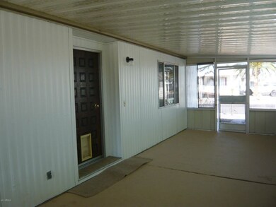 Entrance door in screened patio