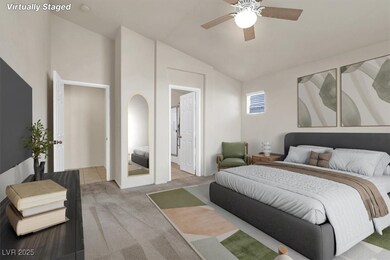 Virtually staged.Primary bedroom, ceiling fan, en-