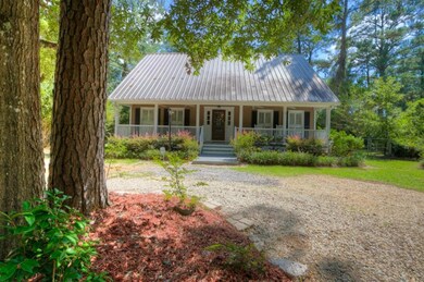 Establish landscaping, lush trees and country feel