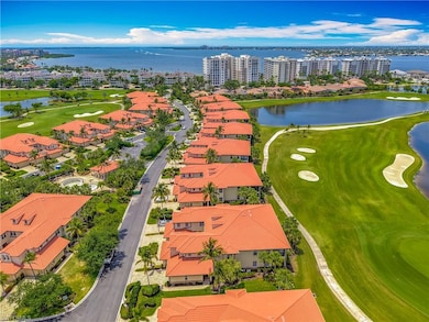 Aerial view of a local golf course, a large body o