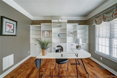 Hardwood floored office featuring a wealth of natu