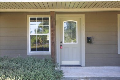 Front Porch perfect for sitting/rocking faces Nort