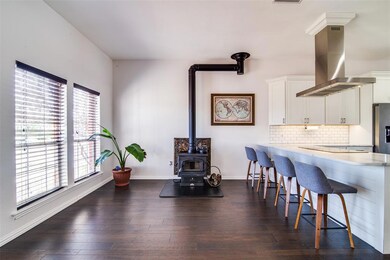 Engineered hardwoods, wood burning fireplace, quartz counters!