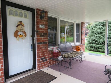 Front porch for relaxing featuring full glass stor