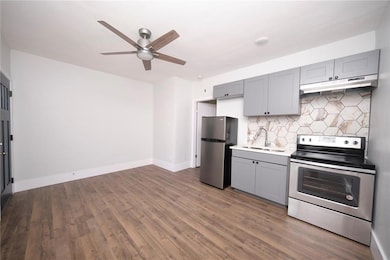 Kitchen featuring stainless steel appliances, a s