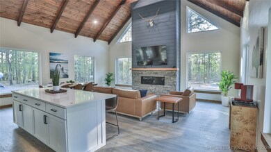 Photo of same model home by same builder