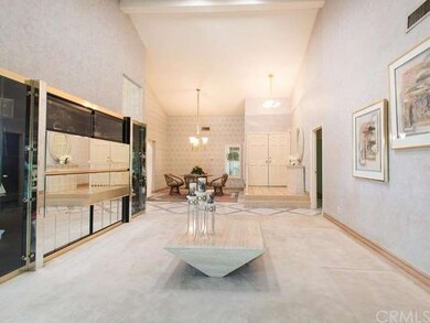 Living room looking into dining area