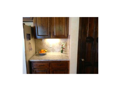 New Granite Countertops & Tile Backsplash