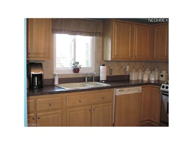 Lots of cupboards and a beautiful counter top. The