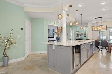 Kitchen with beverage cooler, a kitchen island wit