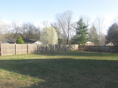 Side yard with partial fence