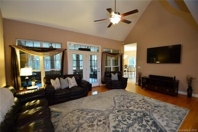 Great Room is centrally located with access to enc