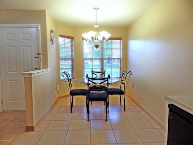 breakfast area and front door 303 Carnat