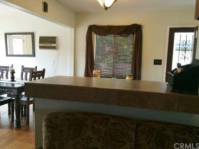Breakfast counter looks on to living room perfect 