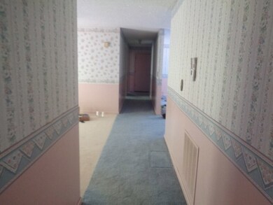 Hallway leading to living room