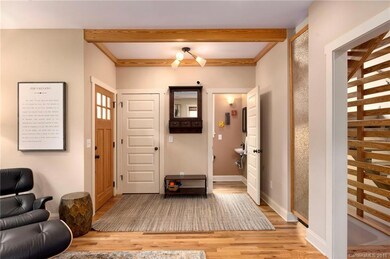 Coat Closet and Half Bath at Entry