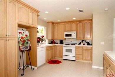 A closer look at all of the kitchen cabinets and d
